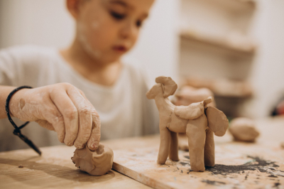 cute-boy-forming-toys-from-clay.jpg